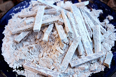 Powdery slate chalk sticks that are edible and tasty